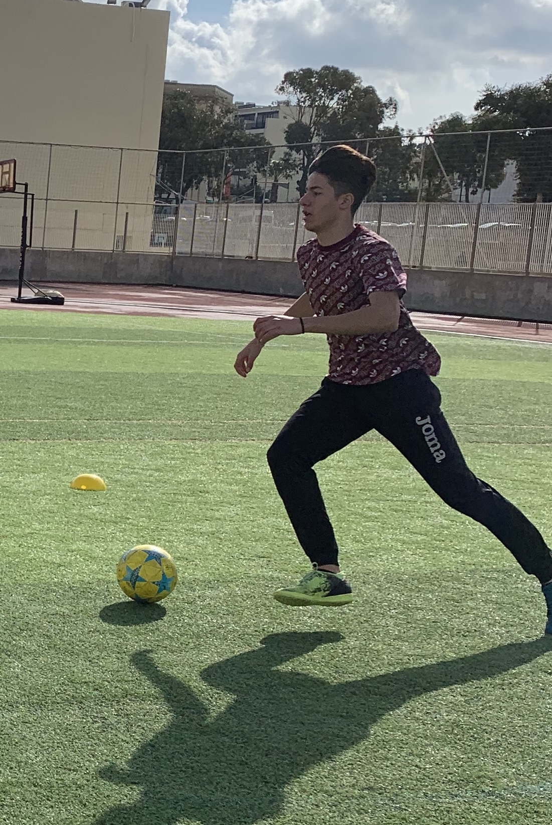Student playing football