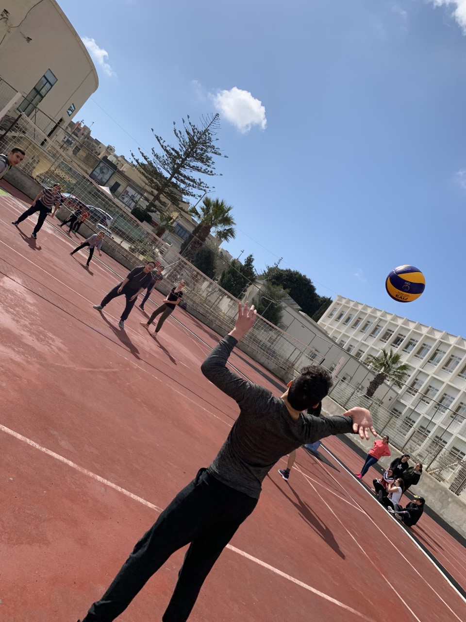 students playing volleyball during P.E.